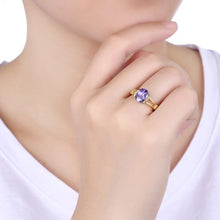 Tanzanite Classic Halo Cut Gold Ring